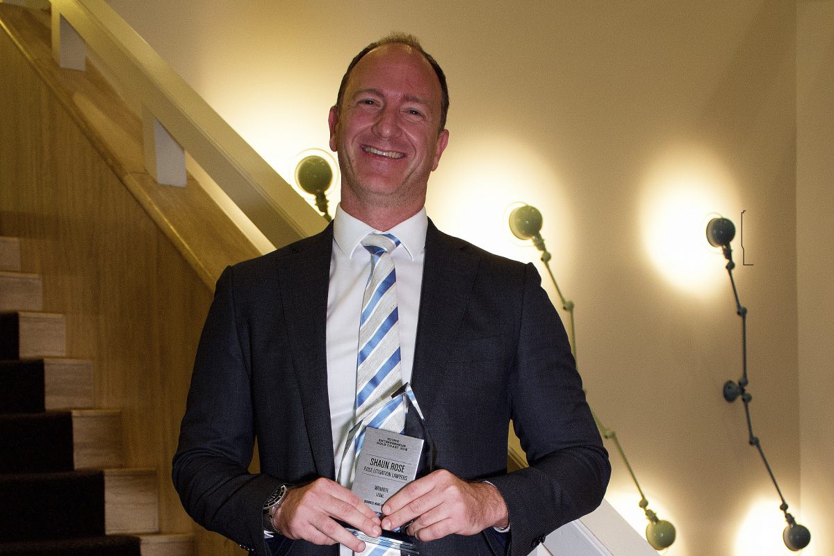 Shaun Rose holding Young Entrepreneur Award