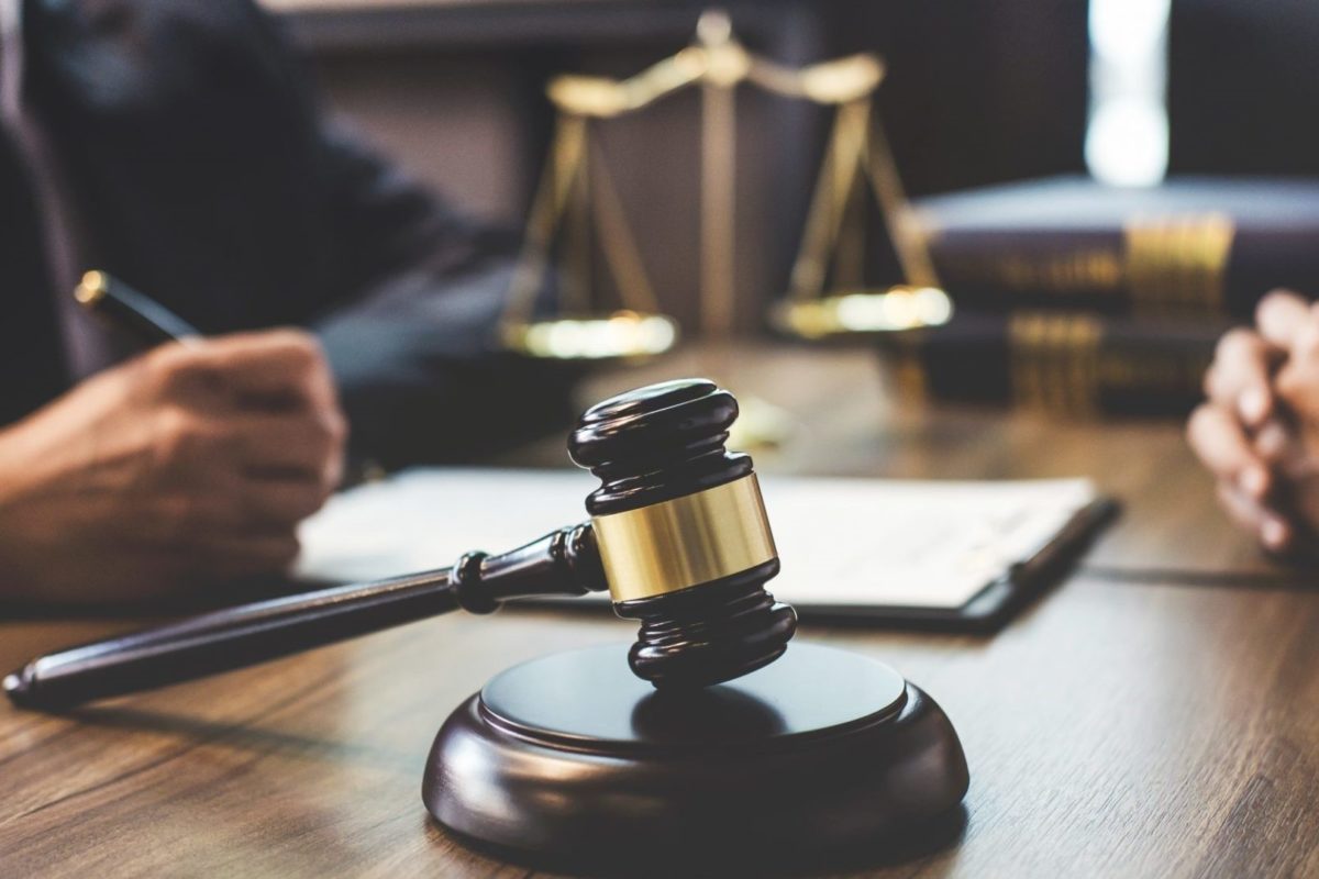 gavel with meeting in background